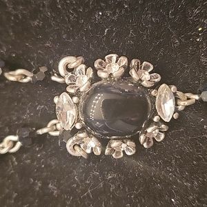 WHBM black and silver extra long rosary style necklace.